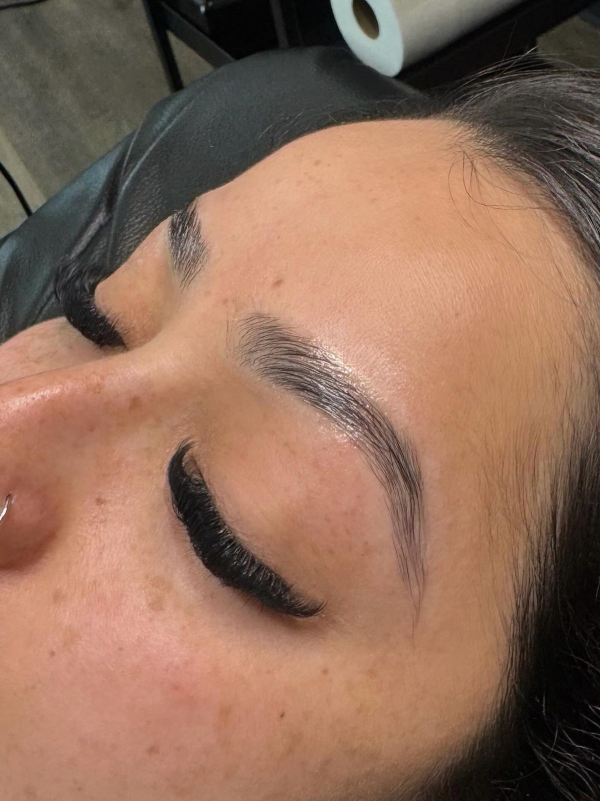 Soft lash set on a freckled client